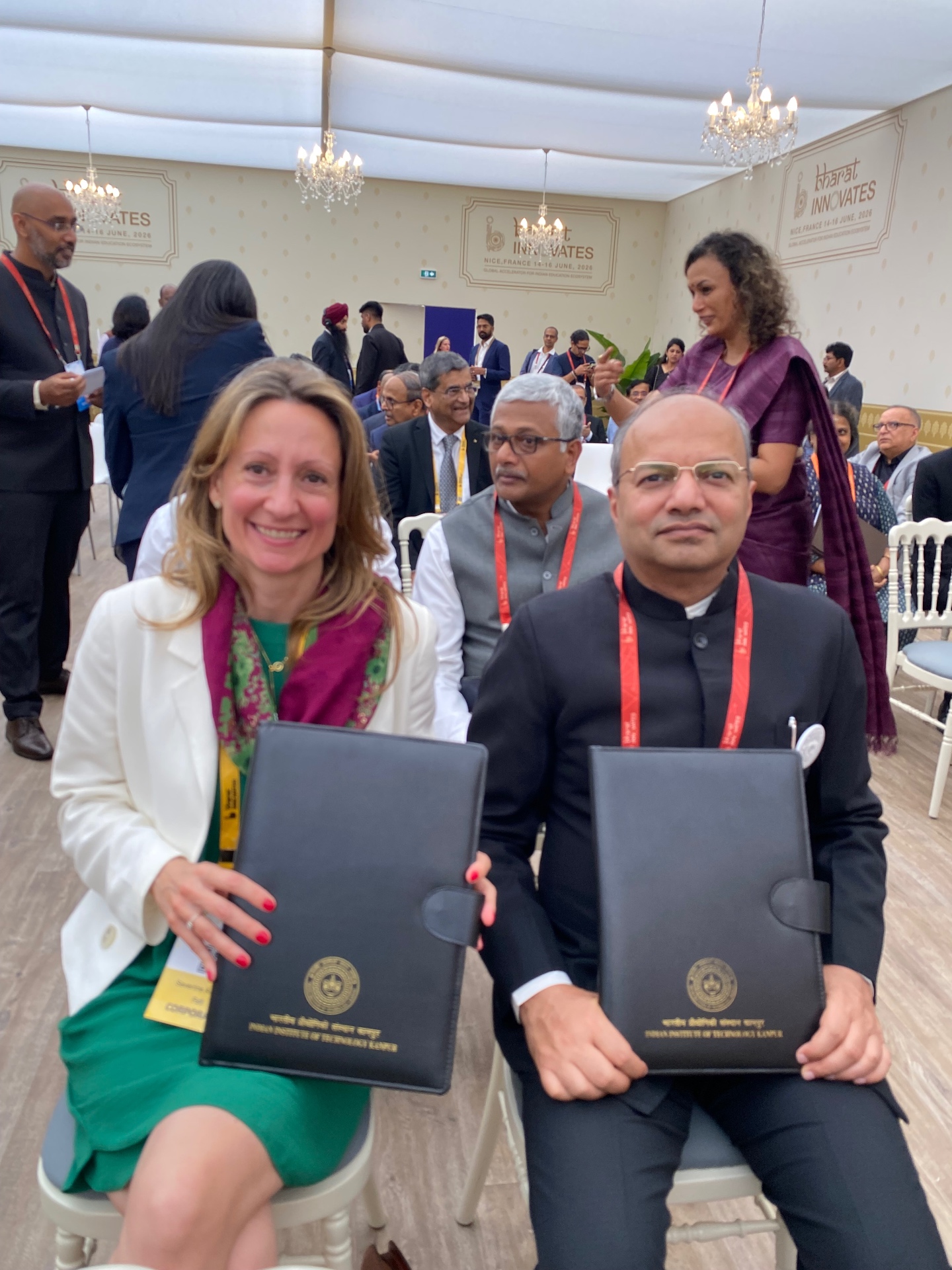 FSFI and IIT Kanpur representatives holding signed partnership documents at Bharat Innovates